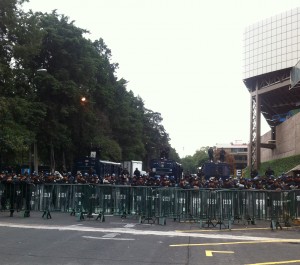 Riot police with their vehicles preparing for the protests