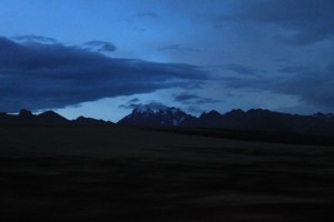 Snow capped mountains in the fading light