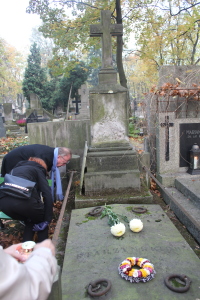 Helping to clean up the graves